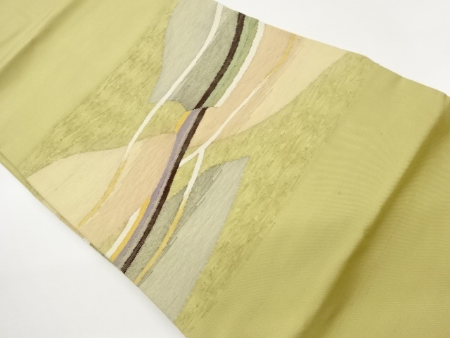 明綴れ横段に抽象模様織出し名古屋帯